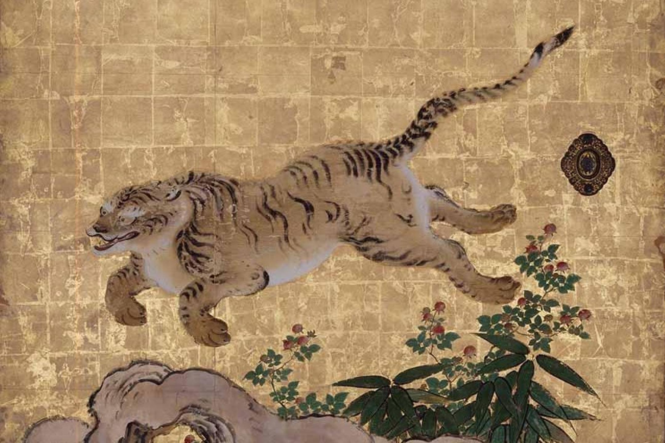 A painting of a tiger jumping over a tree in front of a golden tiled wall
