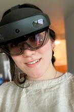 Portrait of Aili Niimura wearing a vr-mask
