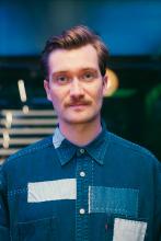 Portrait of Luke Kemp in a jean shirt