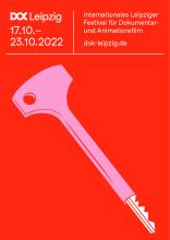 Das Festivalmotiv ist ein pinker Schlüssel im DDR-Design auf rotem Hintergrund