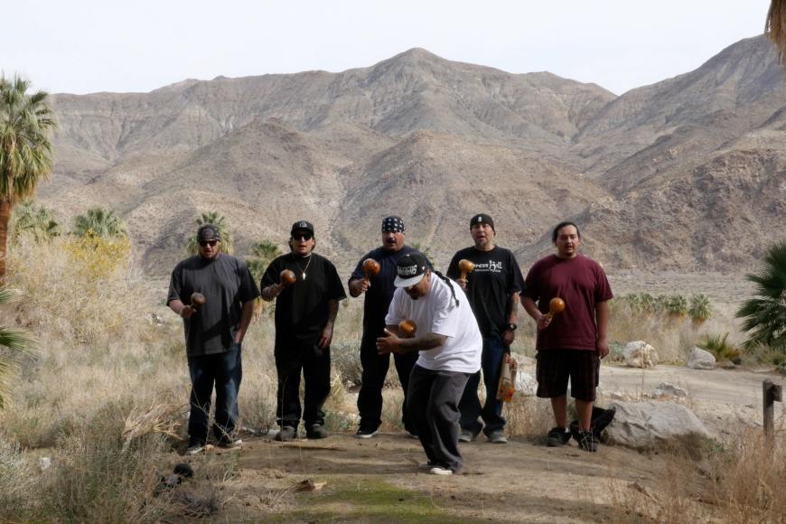 Filmstill Among the Palms the Bomb, Or: Looking for Reflections in the Toxic Field of Plenty